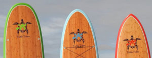 Picture of the Turtle Tides brand stand-up paddle boards.